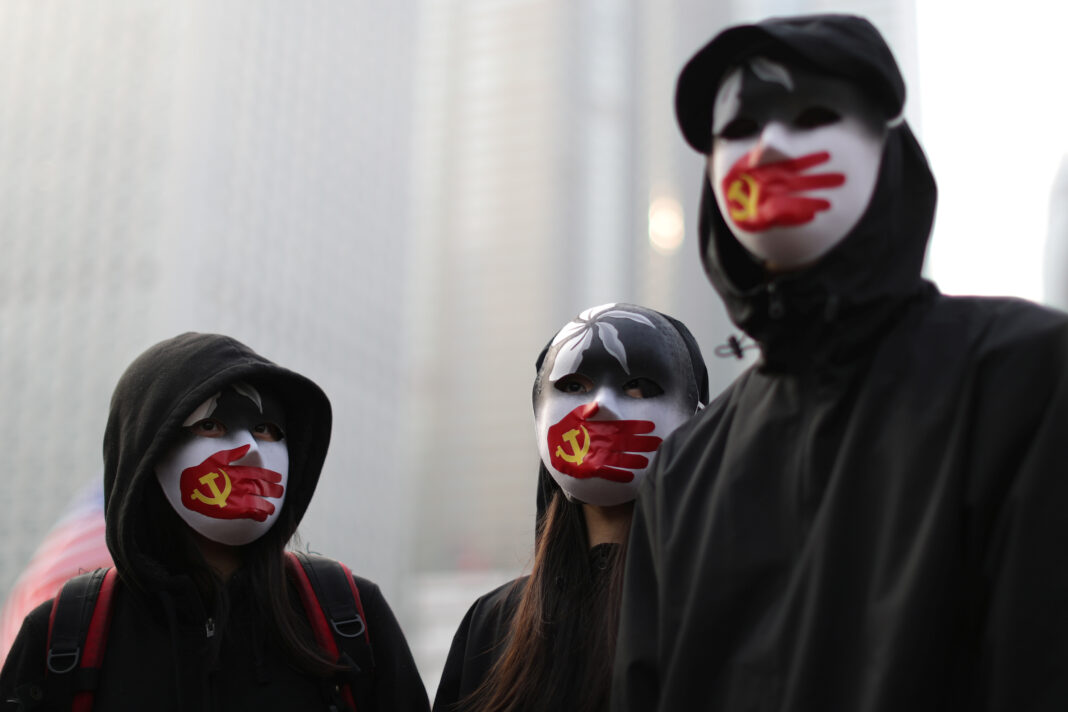 Imagen de archivo de manifestantes en Hong Kong en apoyo de los derechos humanos de los uigures en Xinjiang. 22 diciembre 2019. REUTERS/Lucy Nicholson