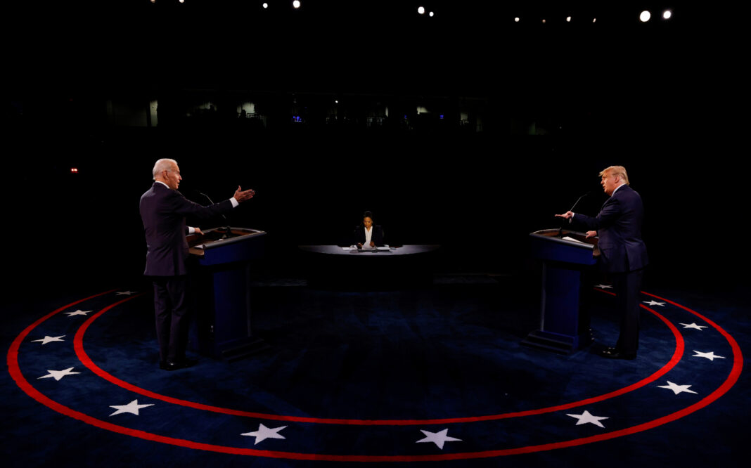 FILE PHOTO: Democratic presidential nominee Joe Biden and U.S. President Donald Trump participate in their second 2020 presidential campaign debate at Belmont University in Nashville, Tennessee, U.S., October 22, 2020. REUTERS/Jim Bourg/Pool